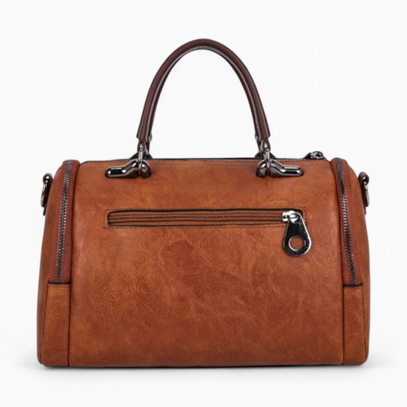 Sac à main cuir marron avec pompon vue de derrière