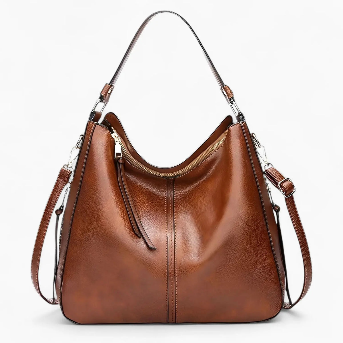 Une belle sacoche au cuir souple et à la forme rigide Une belle sacoche au cuir souple et à la forme rigide